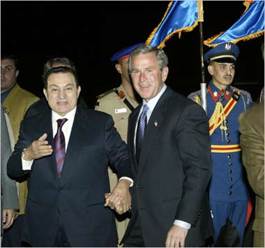 Dictator Hosni Mubarak with his Zioconservative paymaster George Bush